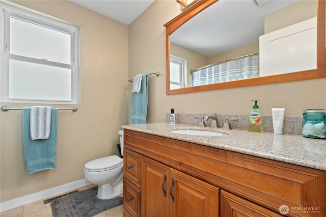 full bathroom with a wealth of natural light, visible vents, toilet, and vanity