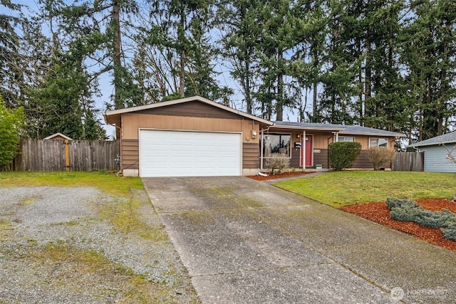 single story home featuring a garage, driveway, a front yard, and fence