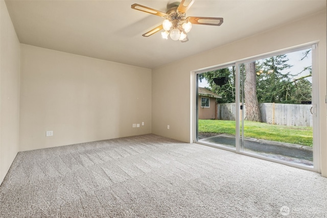 carpeted empty room with ceiling fan