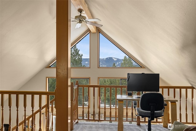 office with lofted ceiling with beams and carpet