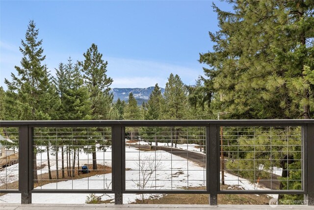 balcony featuring a mountain view