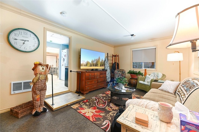 living room featuring carpet floors, visible vents, and crown molding