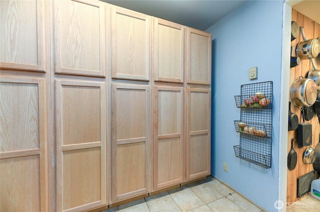 kitchen featuring light brown cabinetry