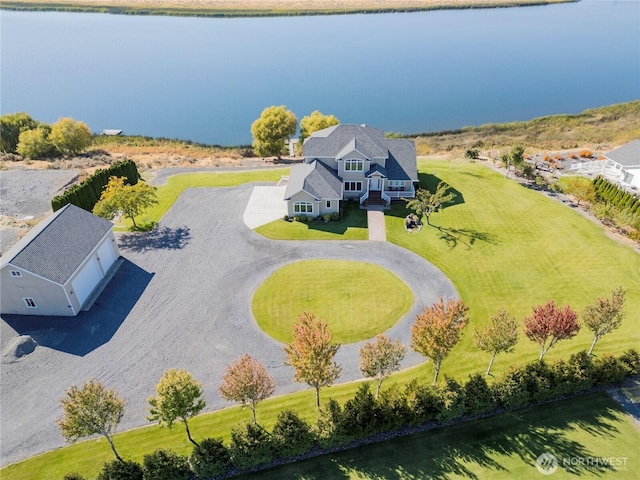 bird's eye view with a water view