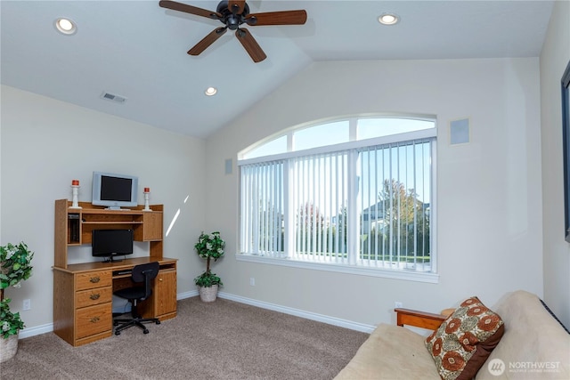 home office featuring lofted ceiling, visible vents, light carpet, and baseboards