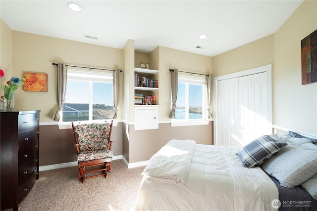 bedroom featuring recessed lighting, carpet flooring, visible vents, and baseboards