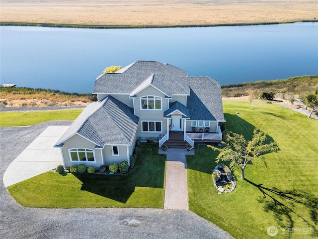 aerial view featuring a water view