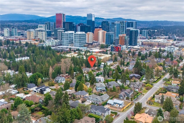 bird's eye view featuring a view of city and a mountain view