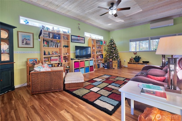 living room with ceiling fan, a wall mounted AC, wooden ceiling, and wood finished floors