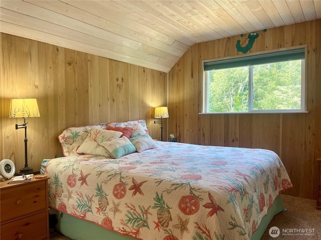 bedroom with lofted ceiling, wooden ceiling, and wood walls