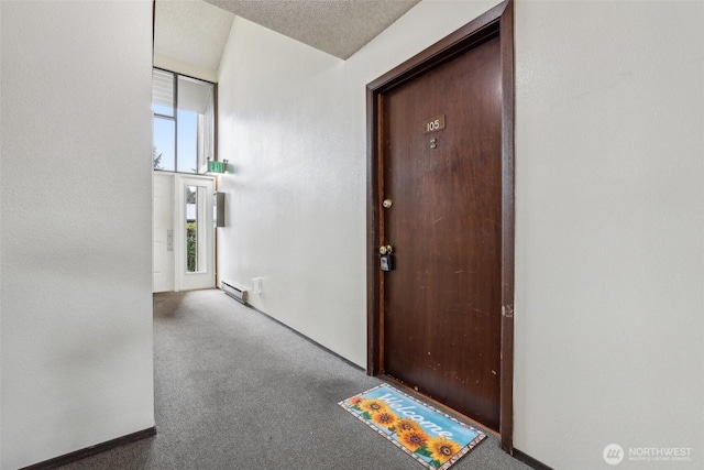 entrance to property with a baseboard radiator