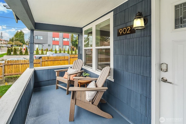 balcony featuring covered porch