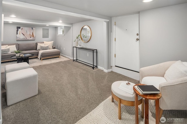 living area featuring electric panel, carpet flooring, recessed lighting, and baseboards