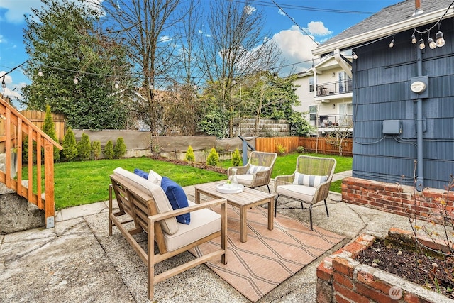 view of patio / terrace featuring an outdoor hangout area and a fenced backyard