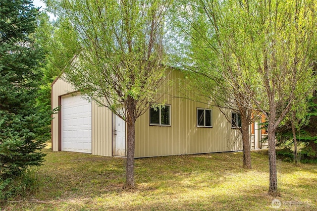 exterior space with a lawn and an outdoor structure