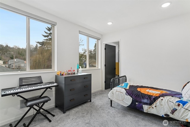 bedroom featuring baseboards, recessed lighting, and light colored carpet