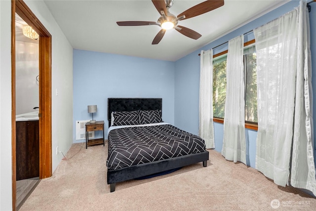 carpeted bedroom featuring a ceiling fan