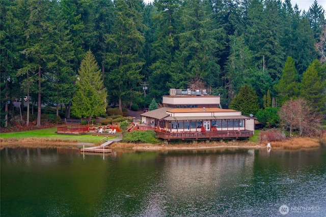 exterior space featuring a view of trees