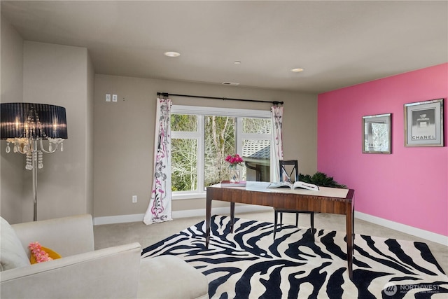 office with carpet floors, visible vents, and baseboards