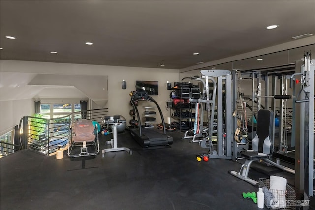 exercise room with visible vents and recessed lighting