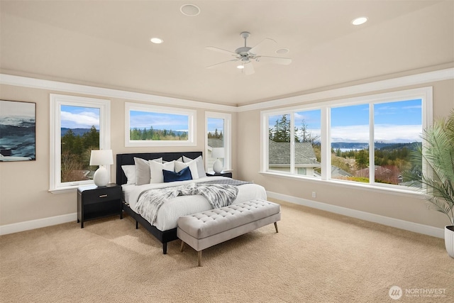 bedroom featuring crown molding, recessed lighting, baseboards, and light carpet