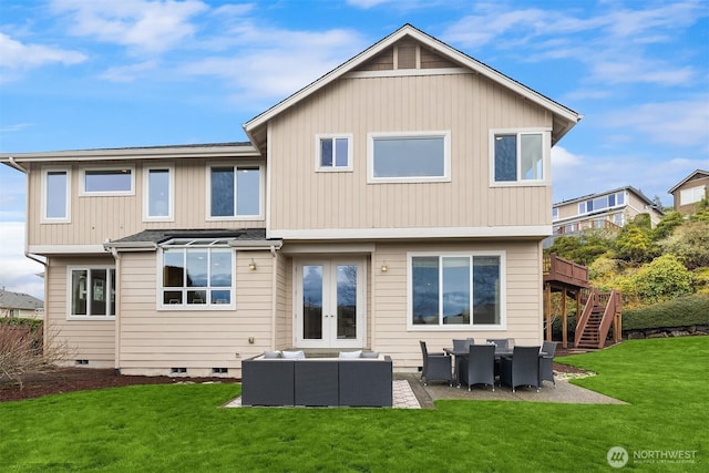 rear view of property featuring stairway, a yard, french doors, outdoor lounge area, and a patio area