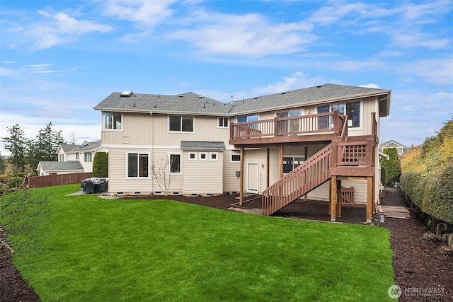 rear view of house with stairway, a wooden deck, a fenced backyard, crawl space, and a lawn