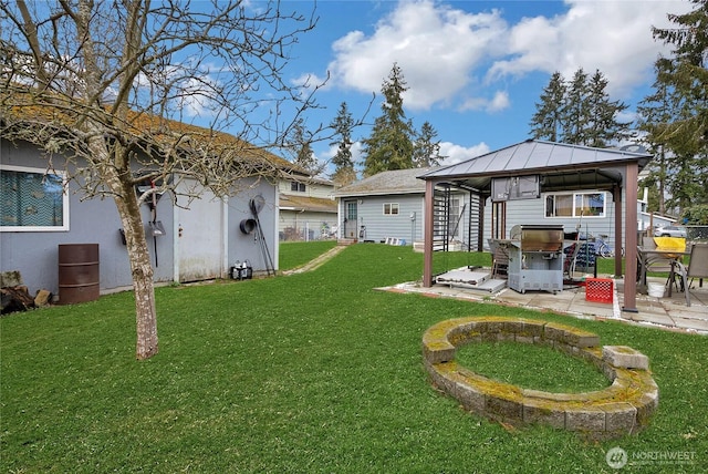 view of yard with a gazebo and a patio area