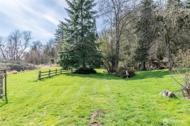 view of yard featuring fence