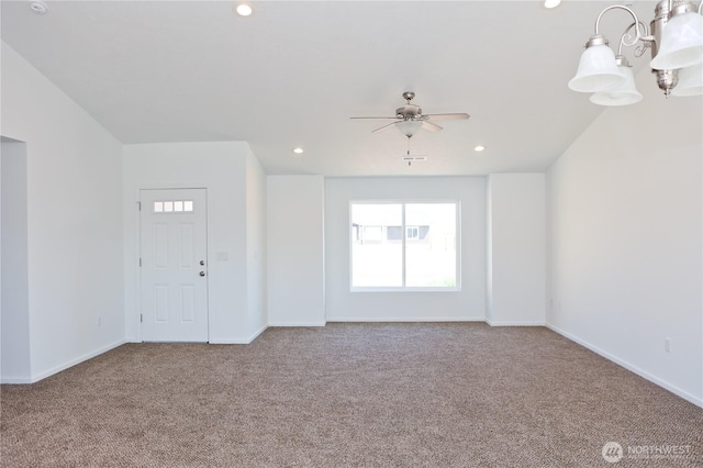 unfurnished living room featuring carpet floors, plenty of natural light, and recessed lighting