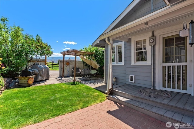 view of yard with a patio and fence