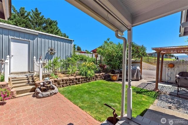 view of yard featuring a patio and a fenced backyard