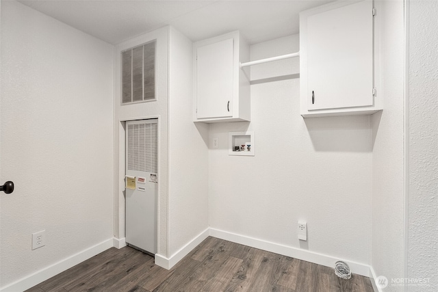 washroom featuring washer hookup, baseboards, visible vents, and dark wood-style flooring