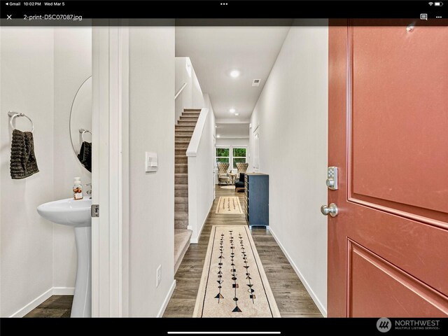 5609 151st Street Ct E, Puyallup, WA 98375 - hallway featuring wood finished floors, recessed lighting, baseboards, and stairway