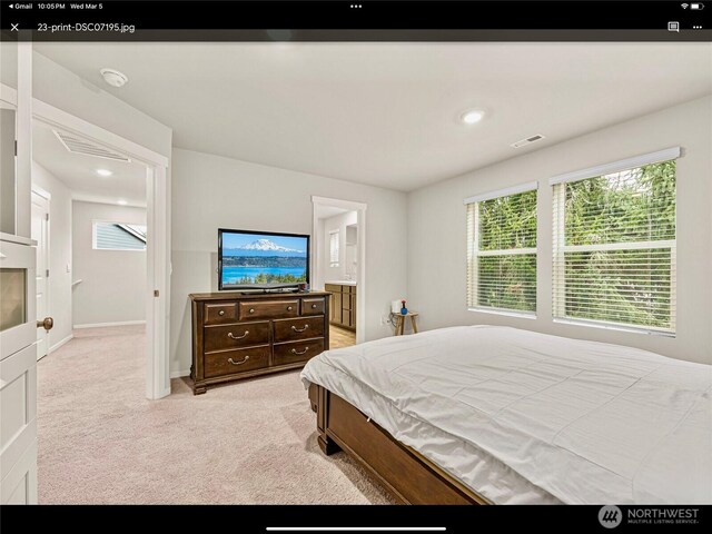 5609 151st Street Ct E, Puyallup, WA 98375 - bedroom with light carpet, ensuite bathroom, baseboards, and recessed lighting