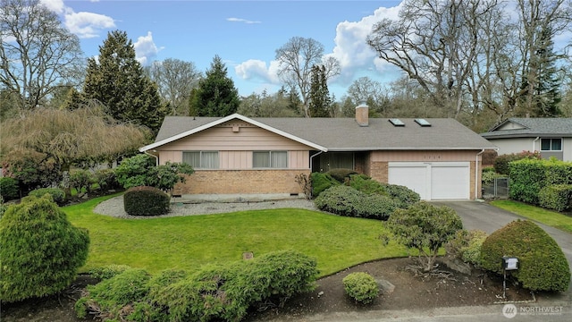 single story home with brick siding, a front yard, a chimney, a garage, and driveway