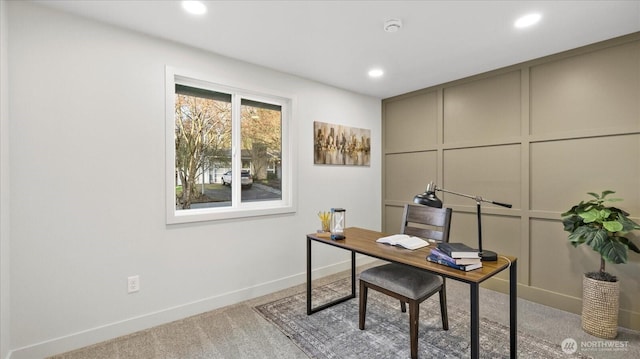 carpeted home office with a decorative wall, recessed lighting, and baseboards