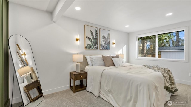 bedroom with light carpet, recessed lighting, and baseboards