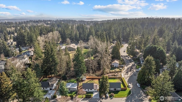 aerial view with a wooded view