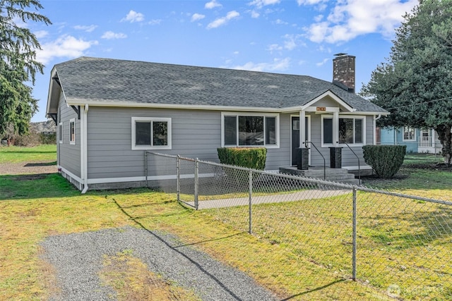 view of front of home featuring a front lawn, a fenced front yard, a shingled roof, central AC unit, and a chimney