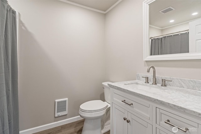 full bath with vanity, toilet, wood finished floors, and visible vents