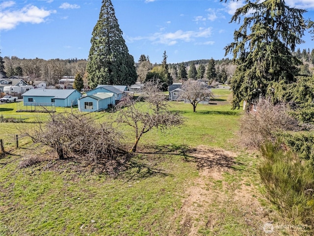 bird's eye view featuring a forest view