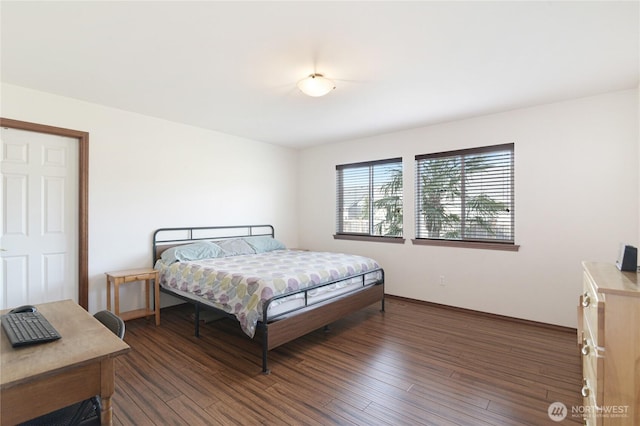 bedroom with wood finished floors