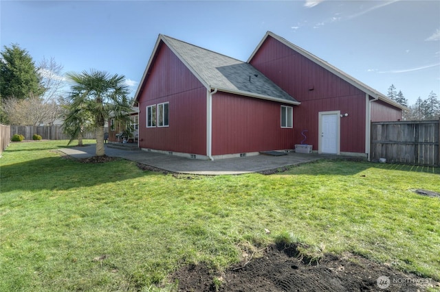 exterior space featuring a yard, a fenced backyard, and a patio