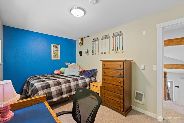 bedroom featuring carpet flooring and baseboards