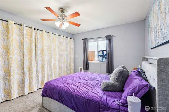 bedroom featuring a ceiling fan and carpet floors