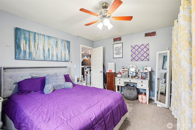 carpeted bedroom featuring a ceiling fan