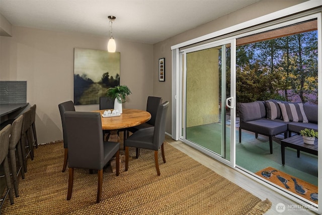 dining area featuring wood finished floors