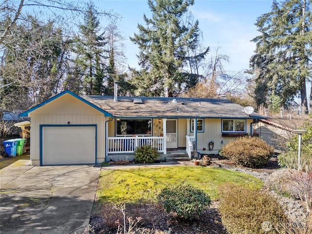 ranch-style home featuring covered porch, concrete driveway, a front lawn, and a garage