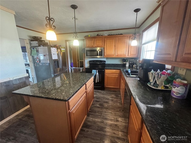 kitchen with brown cabinets, dark wood-style floors, ornamental molding, and stainless steel appliances